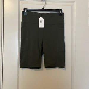 Universal Standard Knockout Bike Shorts in Ivy